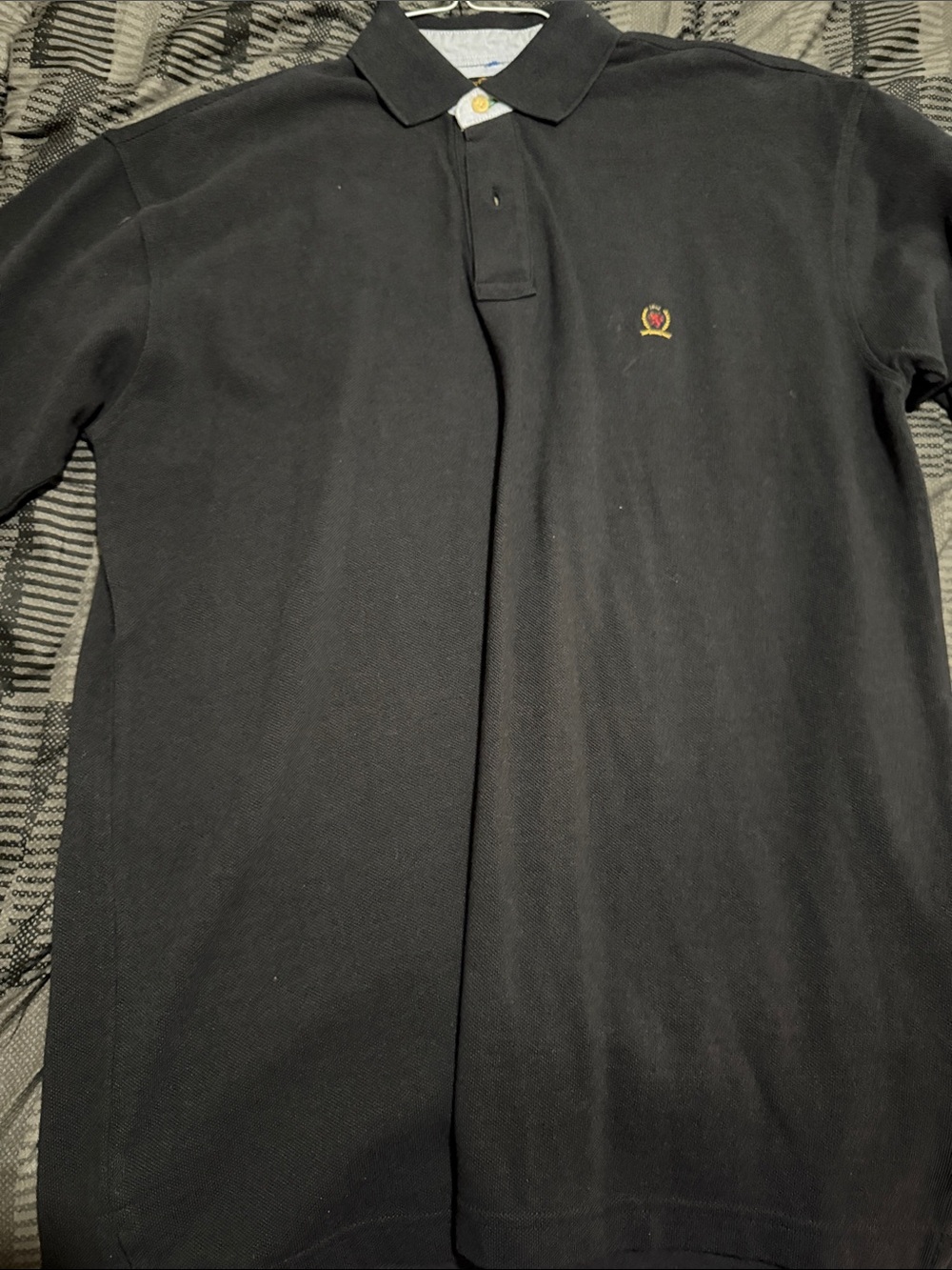 Tommy Hilfiger Black Polo with Crest Accent